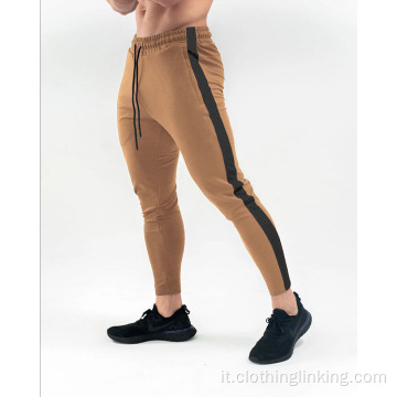 Pantaloni per uomo con righe laterali e tasche
